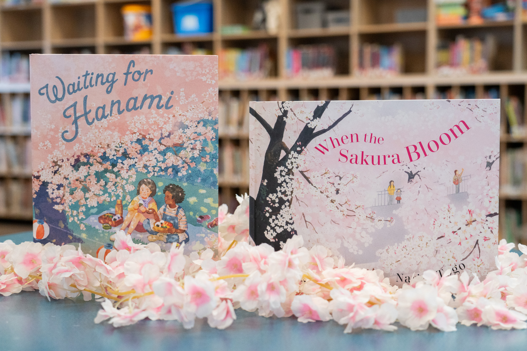 "Waiting for Hanami" by J.P. Takahashi and "When the Sakura Bloom" by Narisa Togo.