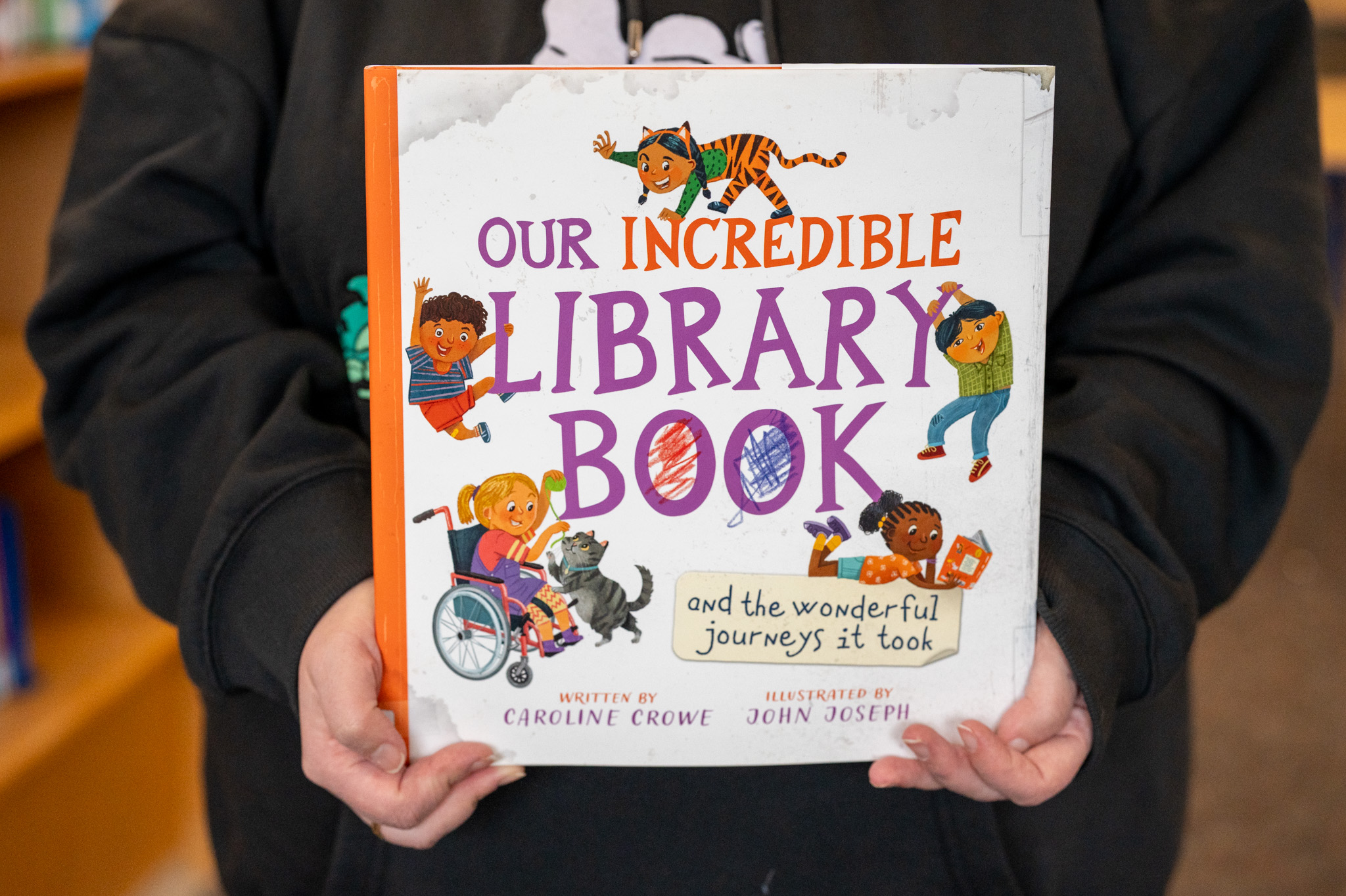 "Our Incredible Library Book (and the Wonderful Journeys It Took)" by Caroline Crowe.