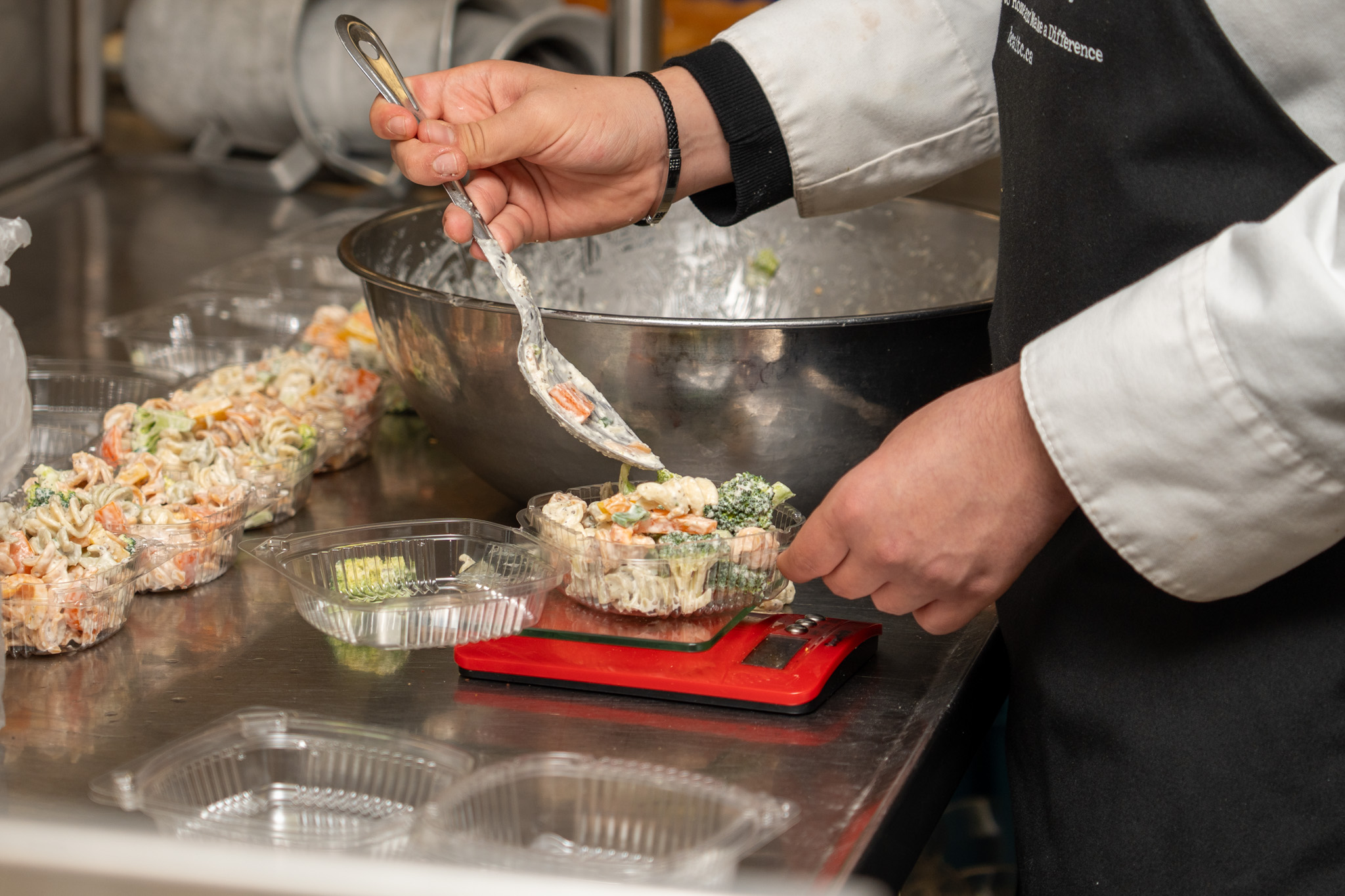 2026-10 CHEF RANDLE AWARD-6 Culinary arts students prepare food in the Maple Ridge Secondary teaching kitchen.