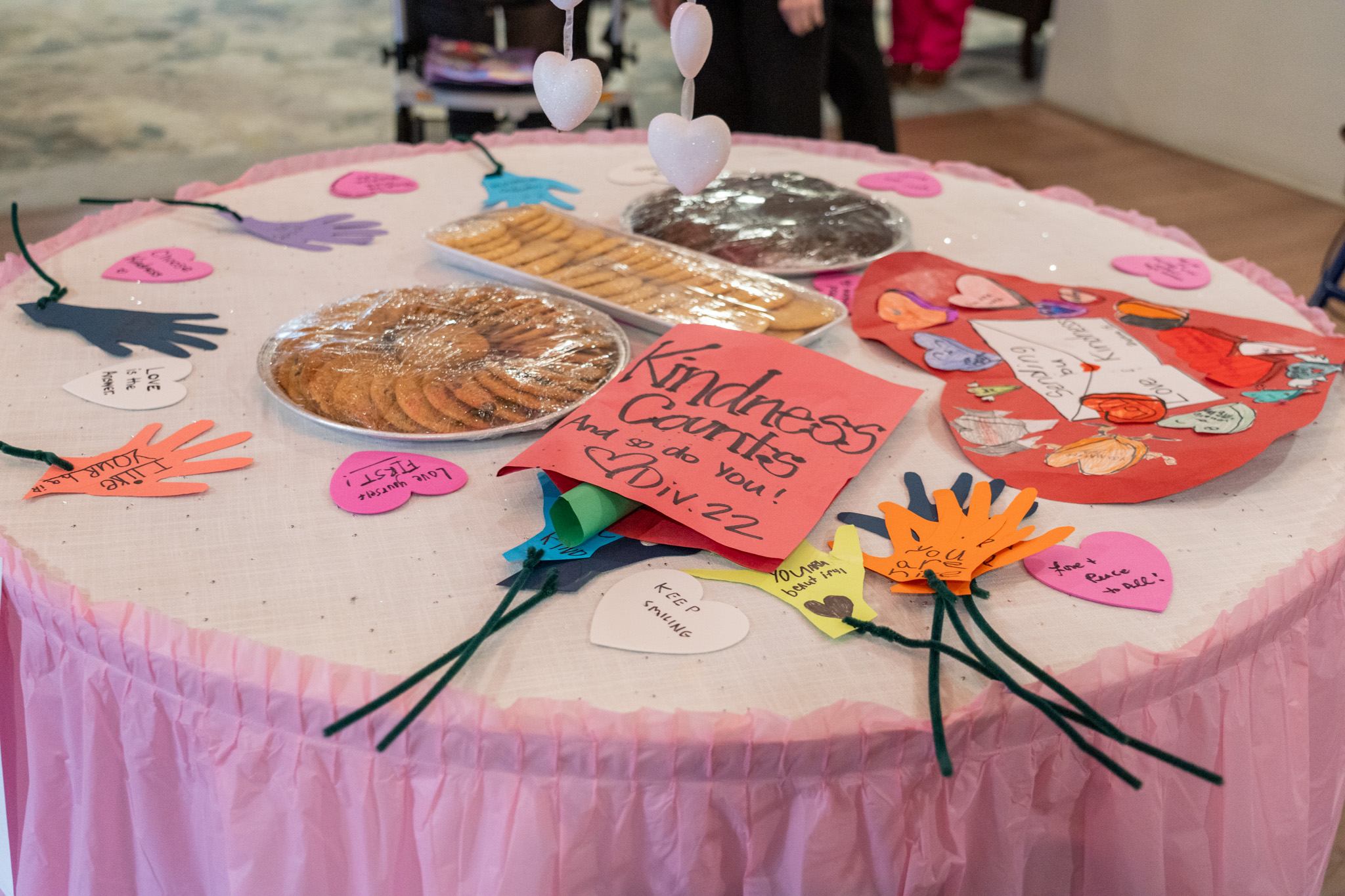 2026 Alouette Kindness Parade-7 A table with cookies and kindness cards on it.