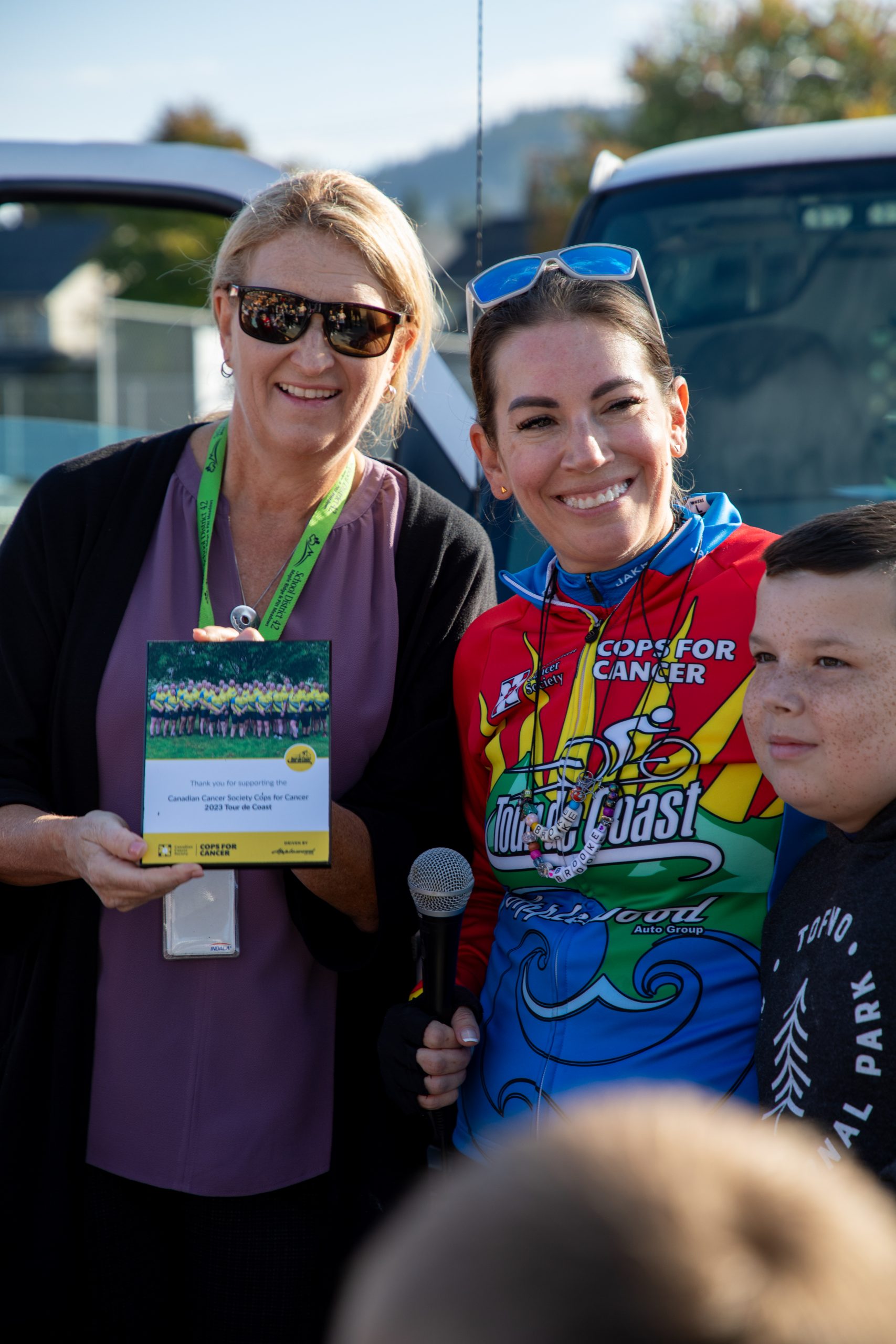 Albion Cops for Cancer-06 Albion Elementary Principal receives plaque for the school's contributions to Cops for Cancer Tour de Coast.